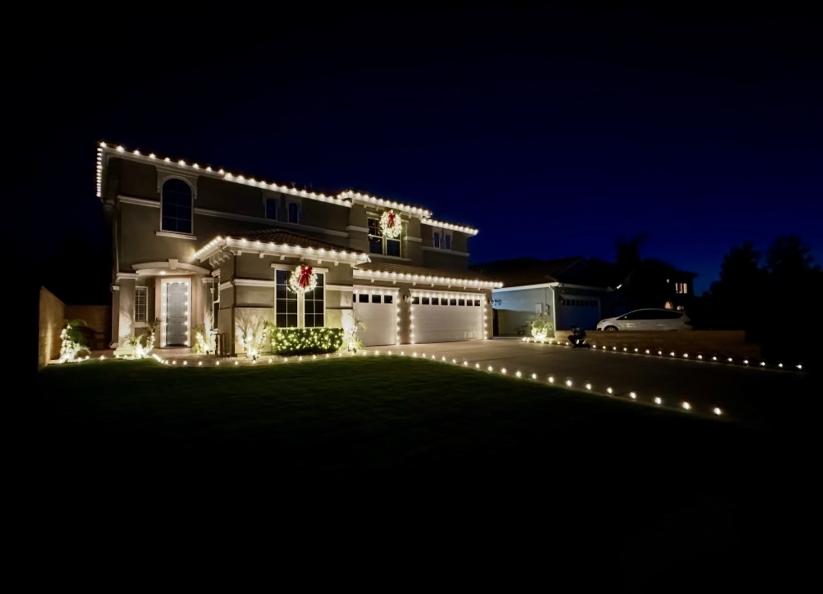 Warm-white two-story with wreaths